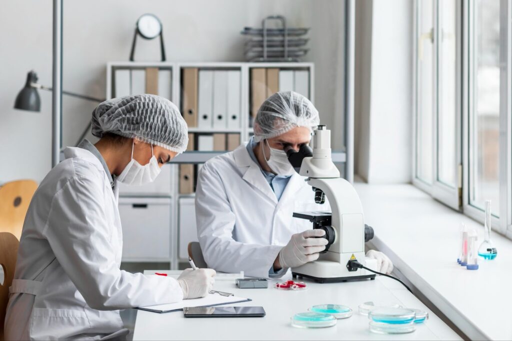 Scientists work in laboratory