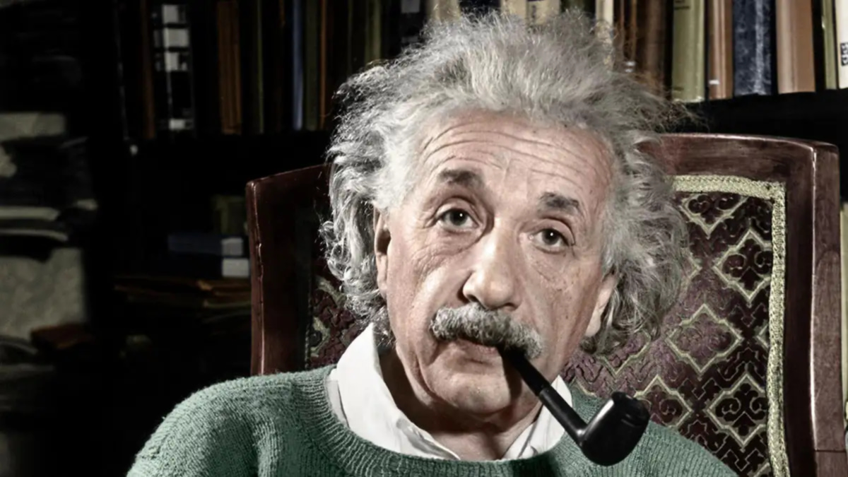 Albert Einstein with a pipe in his mouth